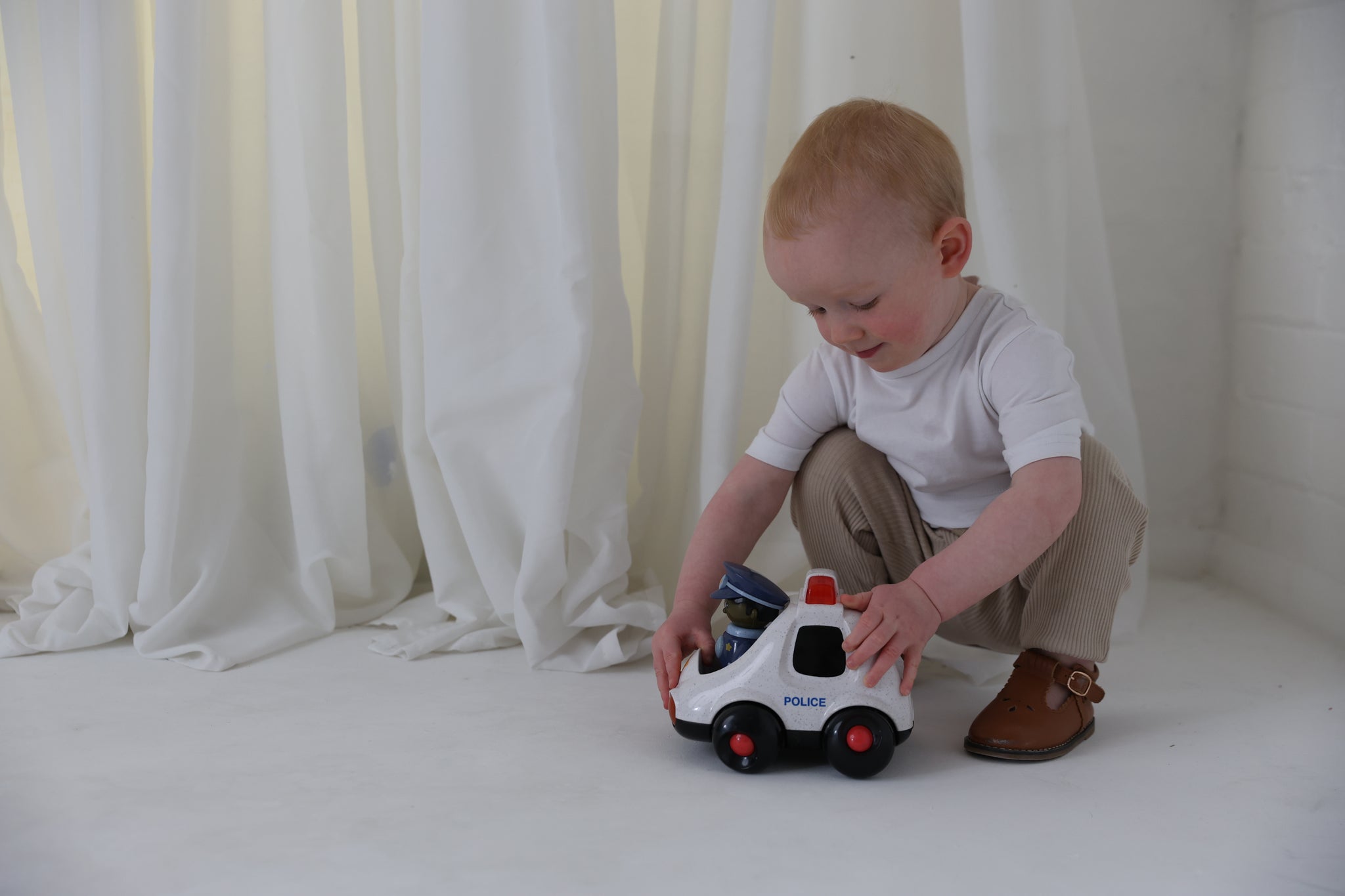 First Friends Police Car – Speedy Monkey